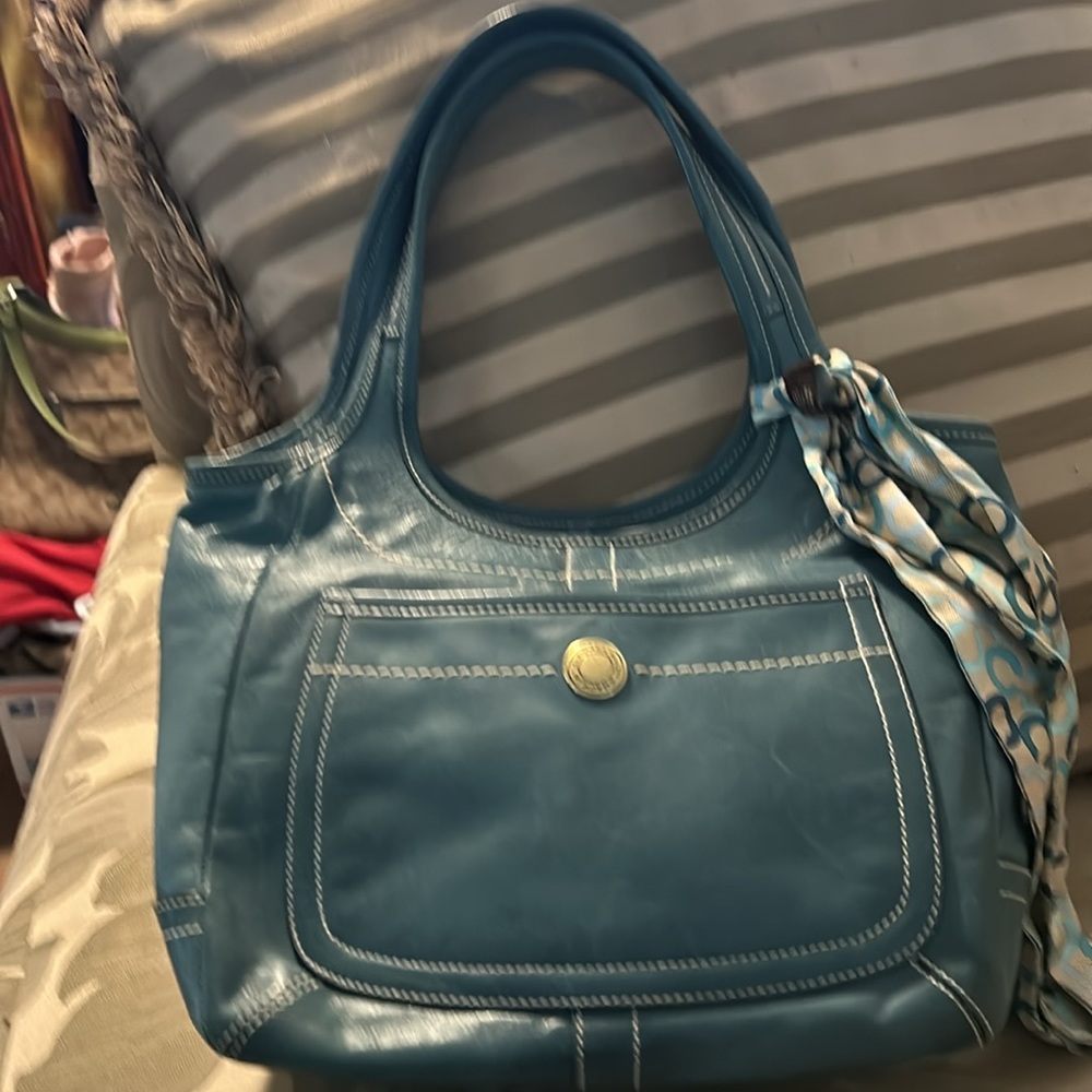 2 coach bags. Think they’re real. Pink and blue from poshmark poshers